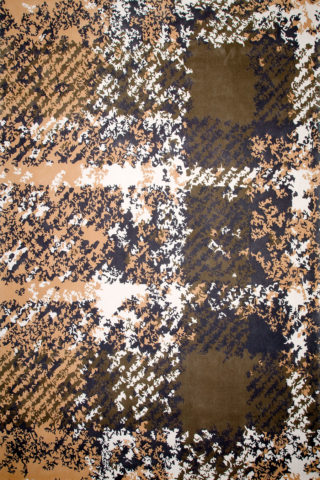 overhead of tartan rug evolve collection brown distressed