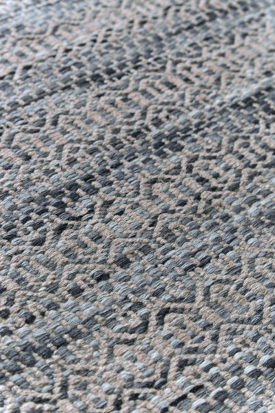 Detailed image of textured Plait Tempest rug in blue colour