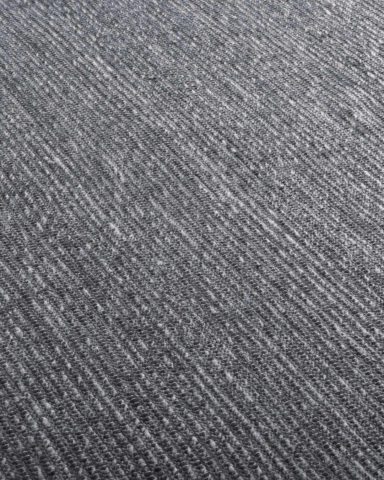 Close up view of textured Stylo rug in dark grey colour