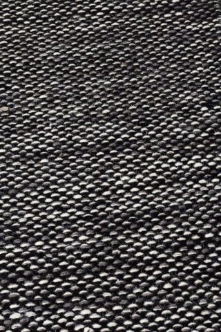 Detailed view of textured Suki rug in grey colour