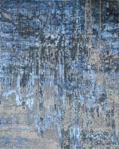 Overhead image of distressed Lake rug on blue colour