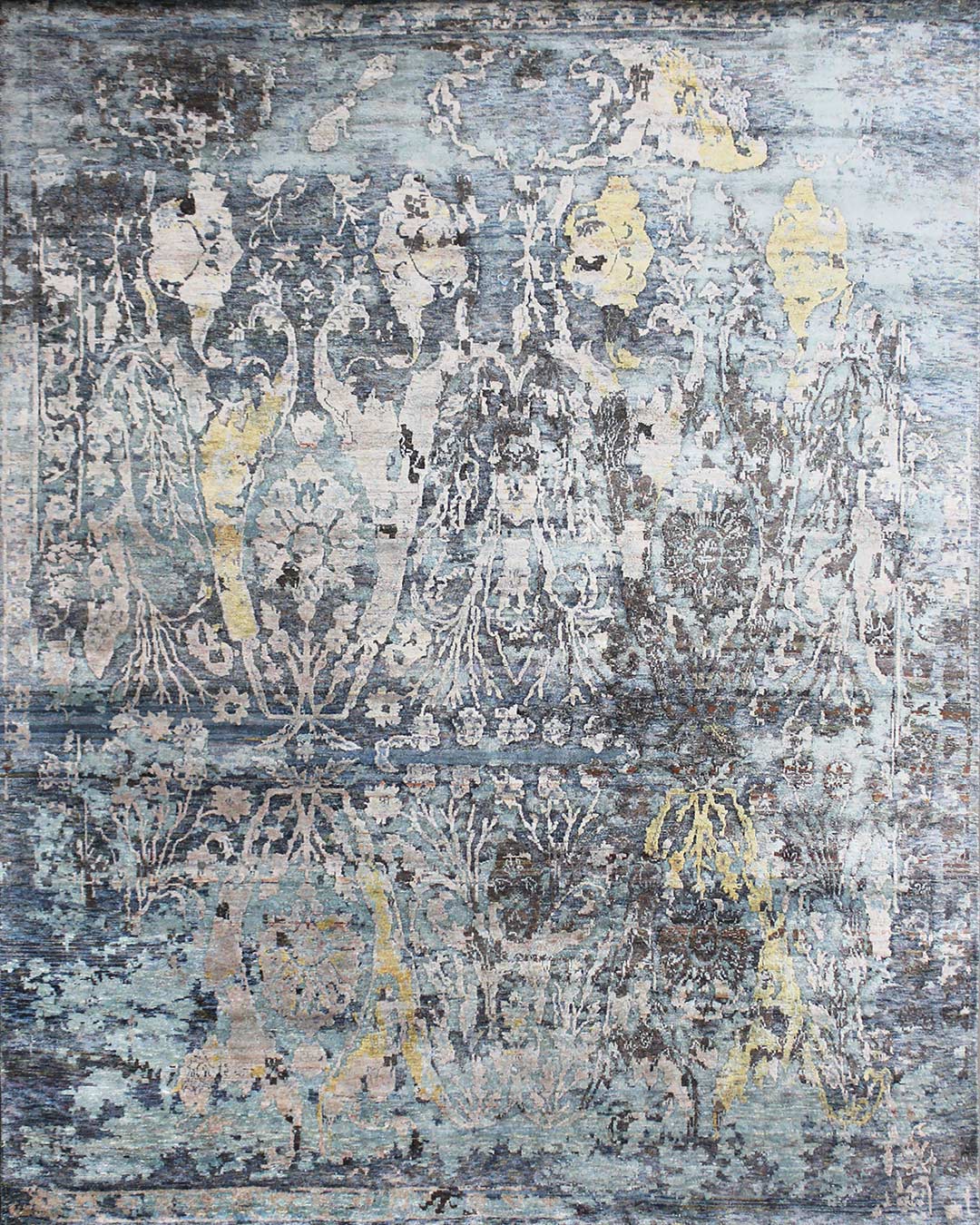 Overhead view of Seville handknot rug in blue and yellow colour