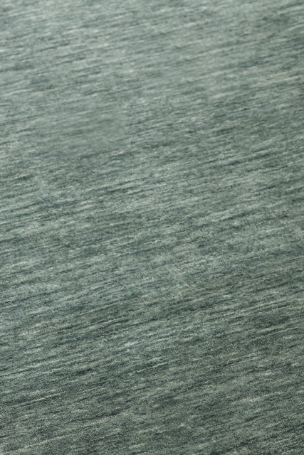 Detailed view of textured Zen rug in green colour