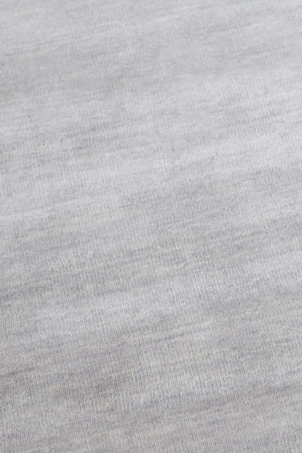Detailed view of textured Zen rug in light grey colour