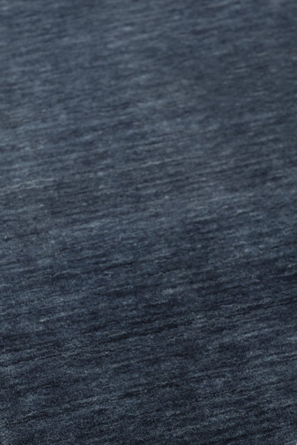 Detailed view of textured Zen rug in navy blue colour