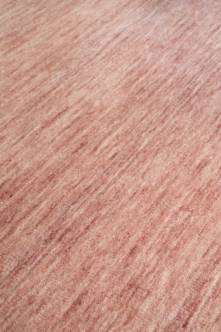 Detailed view of textured Zen rug in pink colour