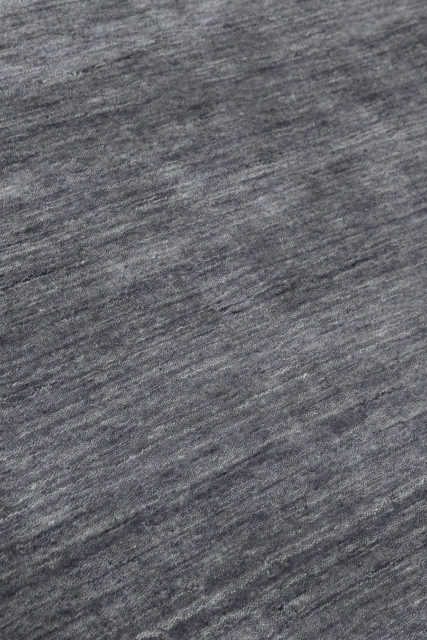 Close up view of textured Zen rug in grey colour