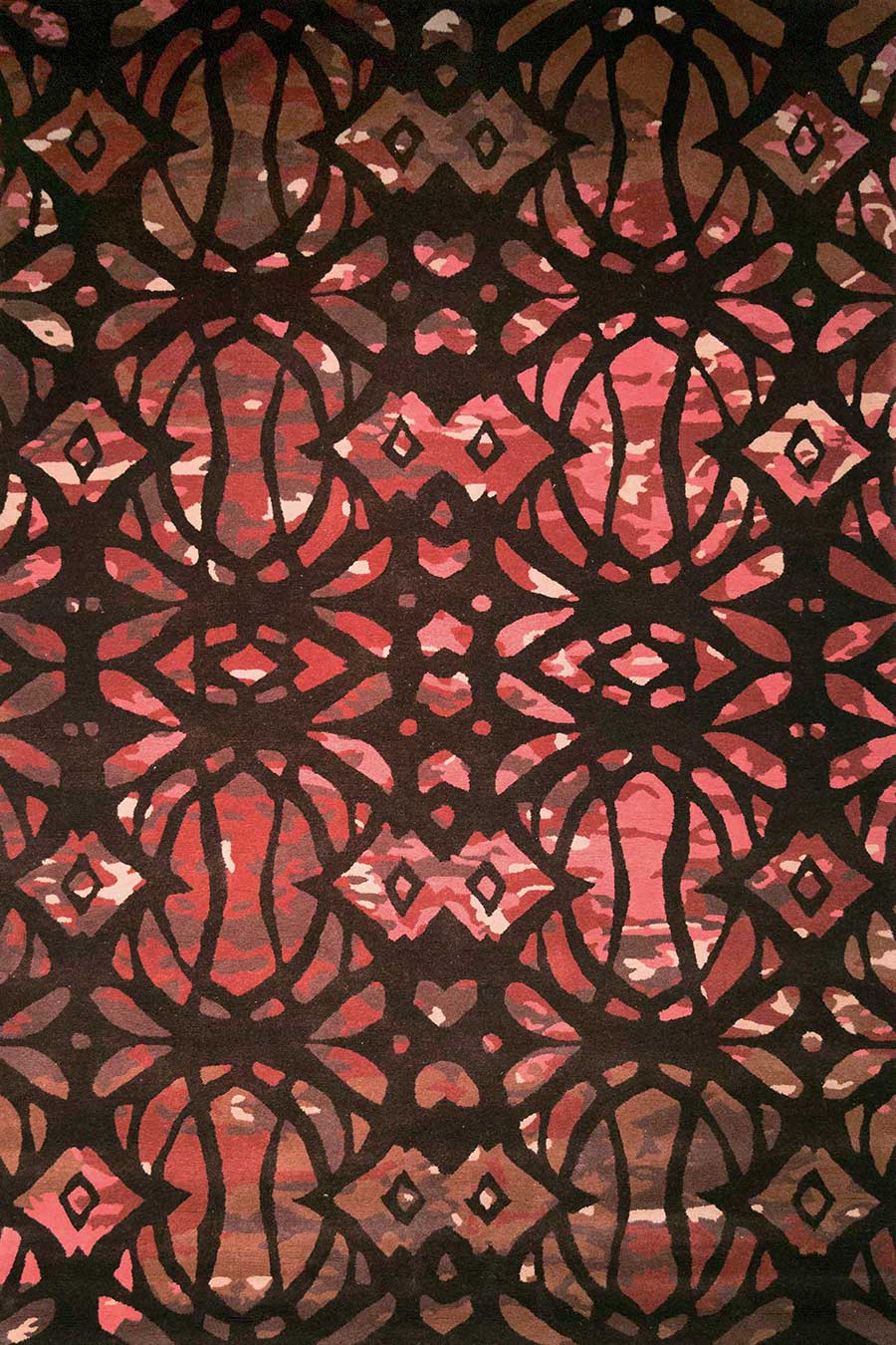 Overhead image of art nouveau Jatropha rug in burgundy colour