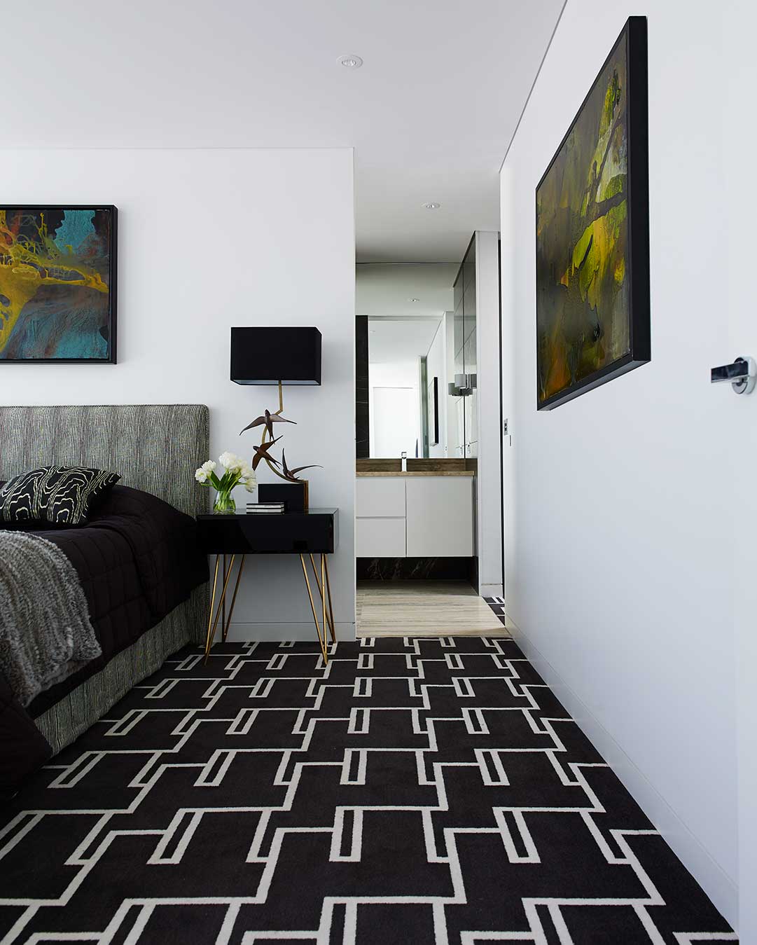 Bedroom view of Dianne black and white patterned Axminster carpet by Greg Natale