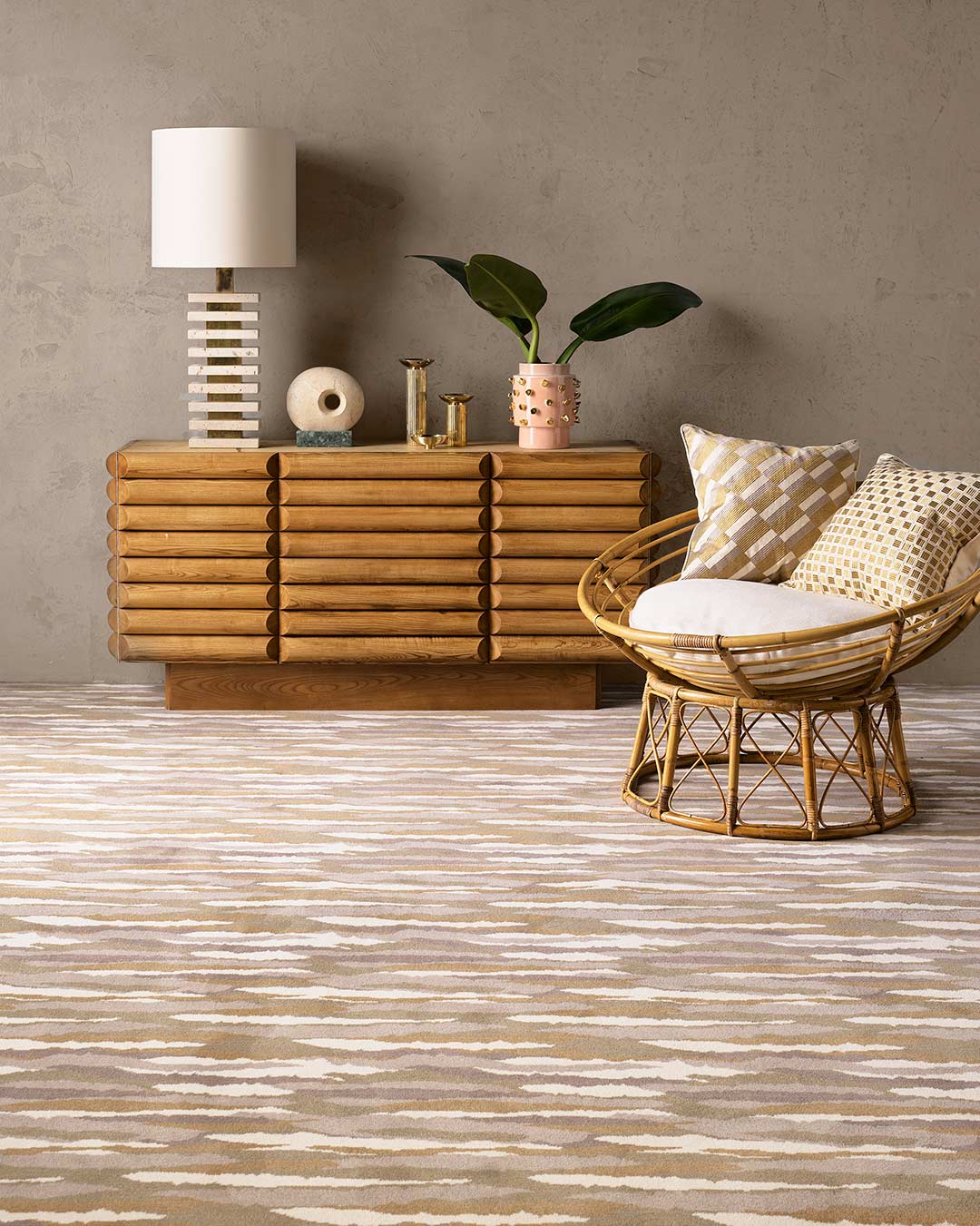 Living room view of Drift brown patterned Axminster carpet by Greg Natale