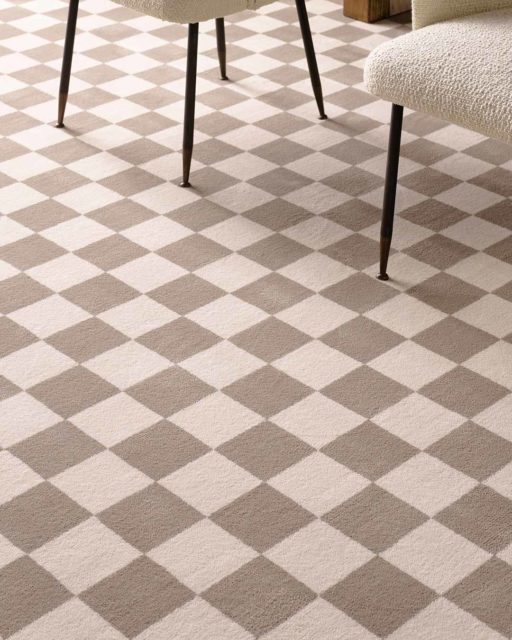 Close up view of Match checked grey Axminster carpet by Greg Natale