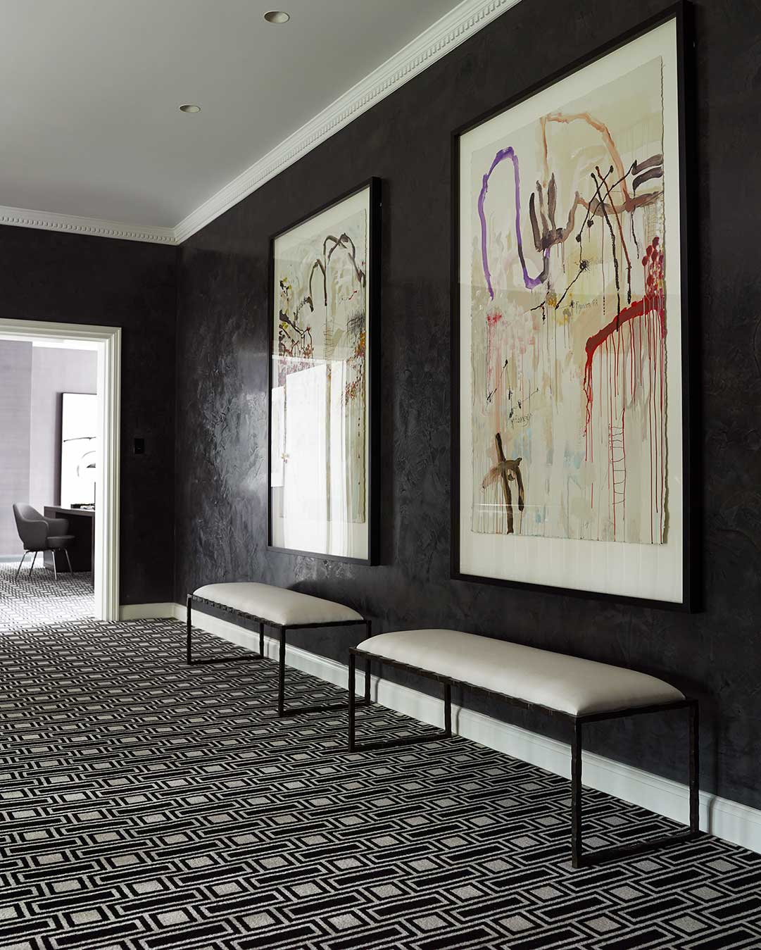 Hallway view of Tom black and white geometric Axminster carpet by Greg Natale