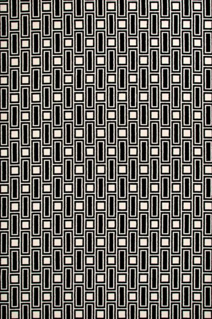 Overhead view of Tom black and white geometric Axminster carpet by Greg Natale