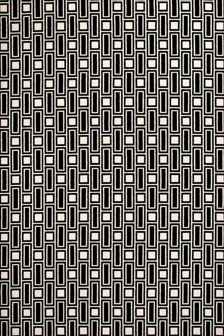 Overhead view of Tom black and white geometric Axminster carpet by Greg Natale