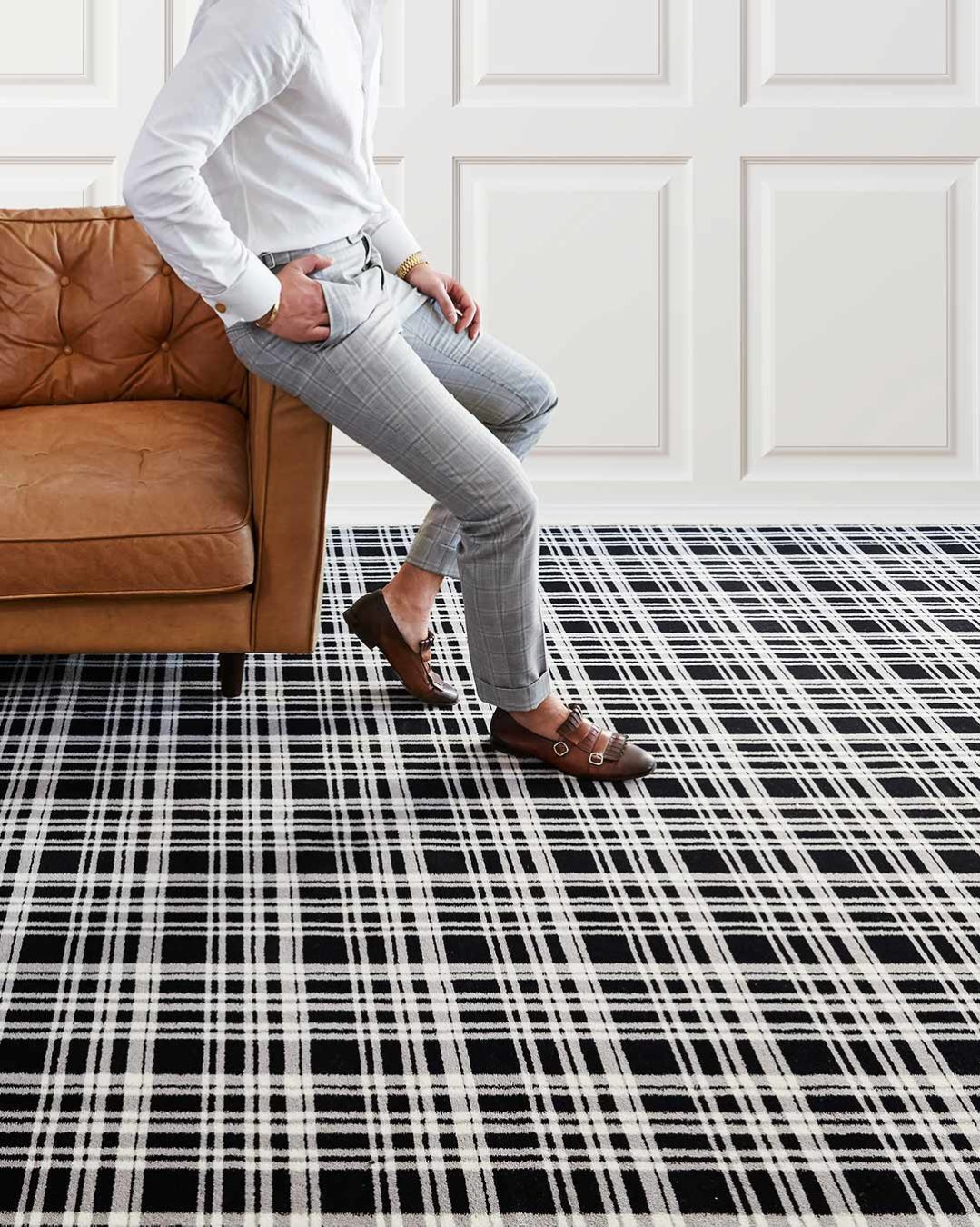 Living room view of Alford black and white tartan Axminster carpet