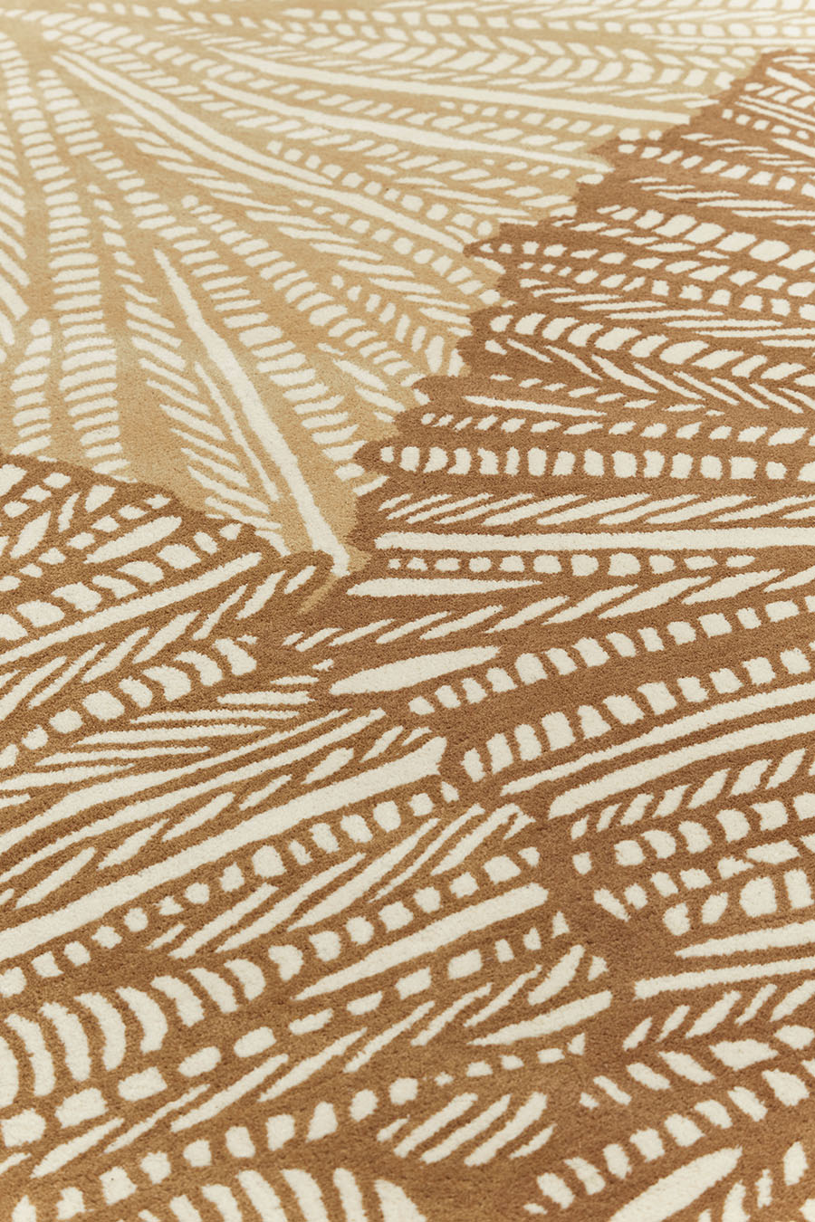 Close up image of Coral Medal rug in brown