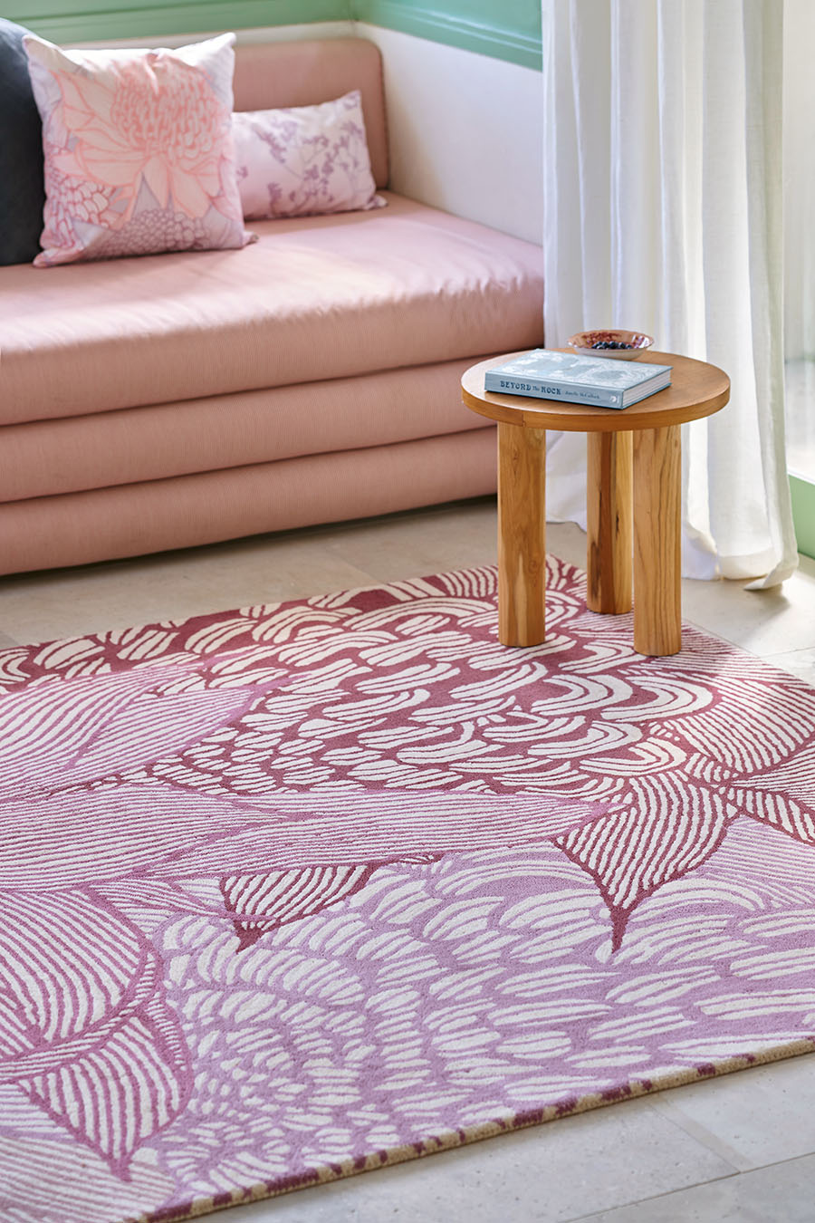 Living room image of pink floral Telopea Bloom rug