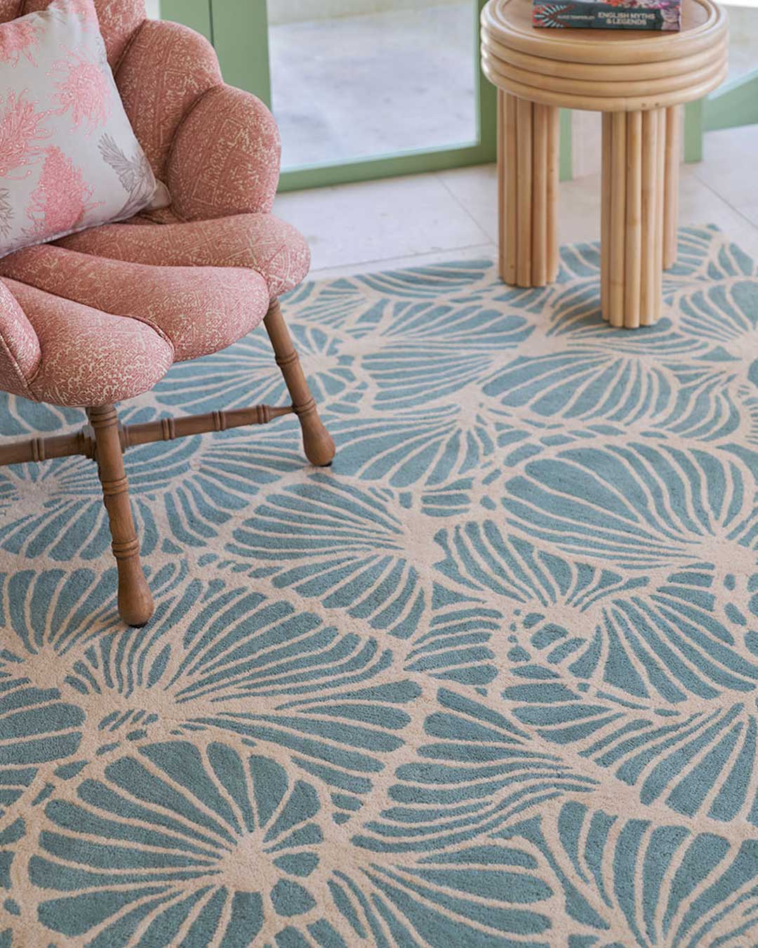 Closeup living room image of blue Mallee Buds rug