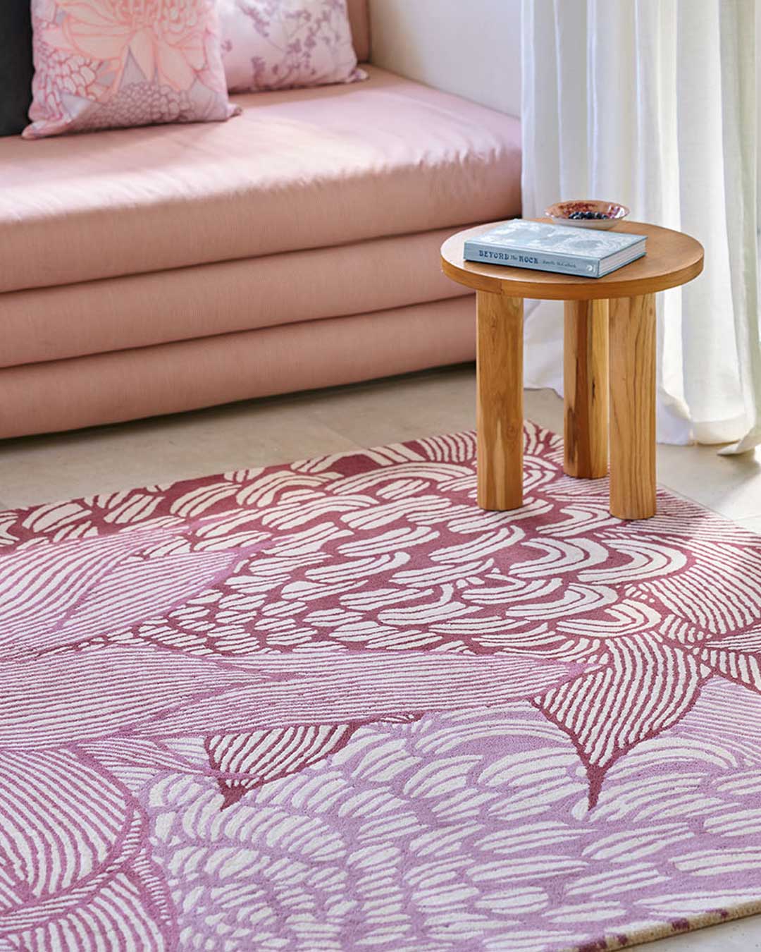 Living room image of pink floral Telopea Bloom rug