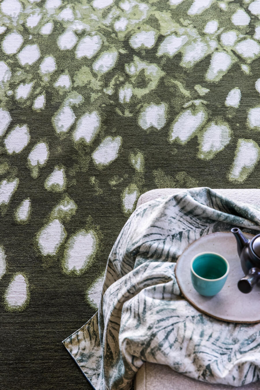 designer rugs shibori Mackeral Sky Green lounge close up
