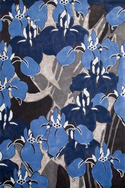 overhead of ayame rug by akira in blue floral pattern and grey background