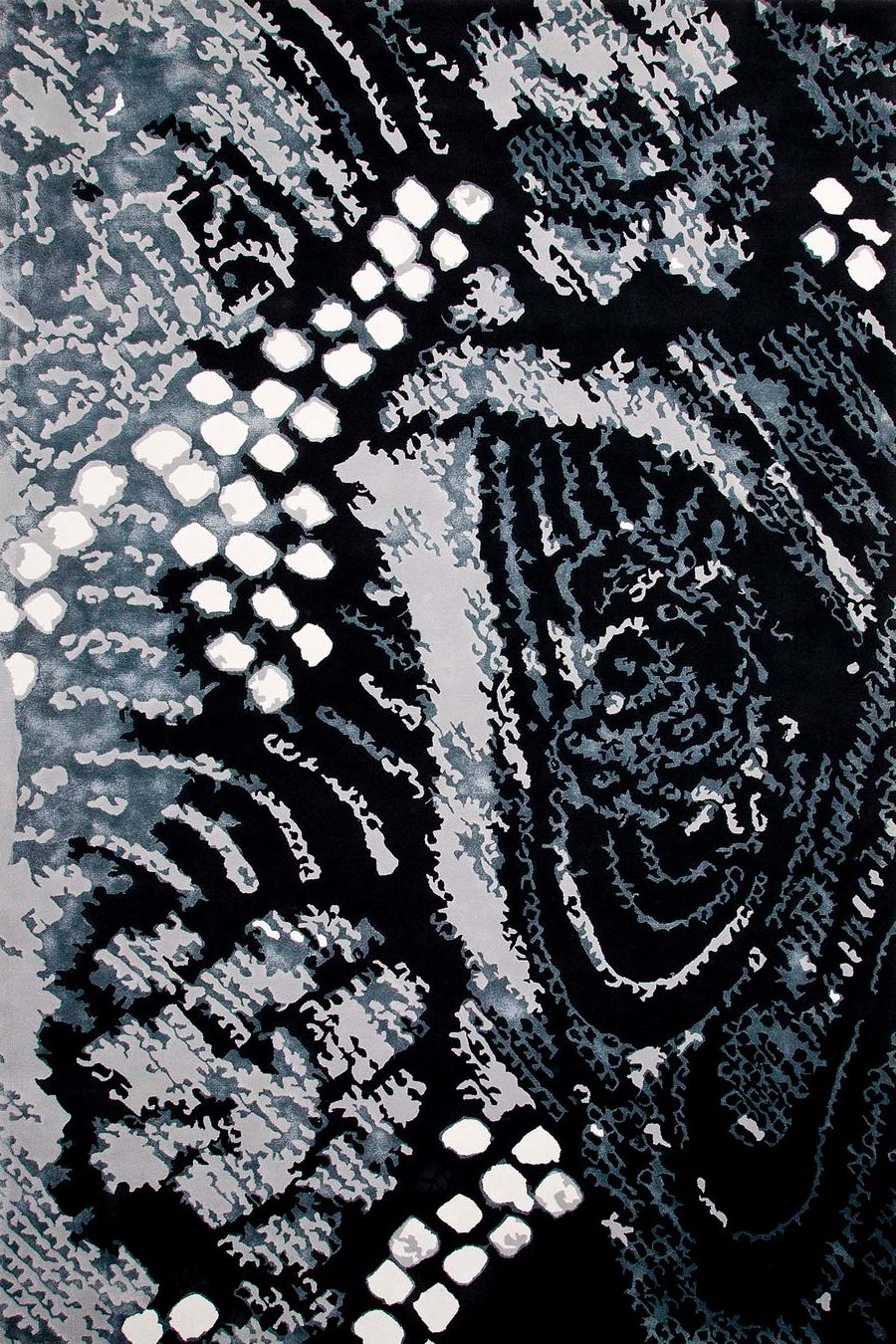 overhead of shibori rug by akira in black and grey abstract pattern