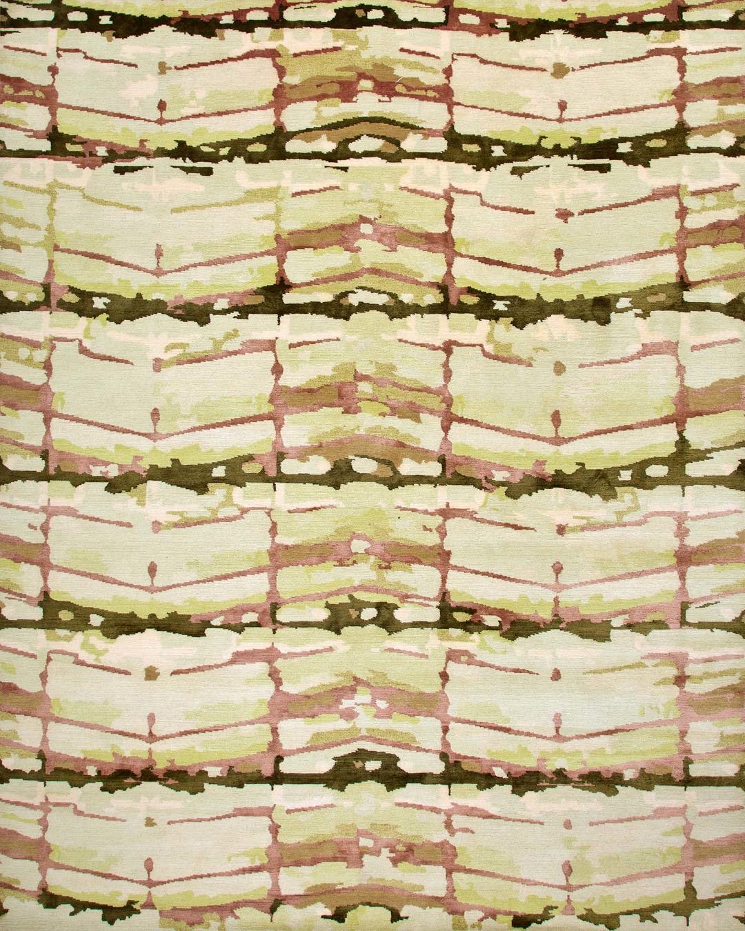 overhead of fence rug by anna carin in abstract mirrored pattern beige background