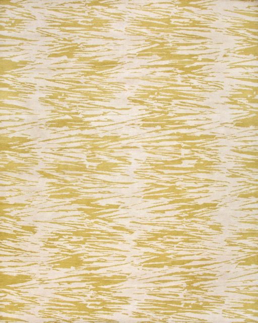 overhead of straw rug by anna carin in beige organic pattern