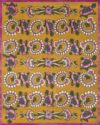 overhead of kandilli rug by anna spiro in abstract floral pattern mustard background and pink border