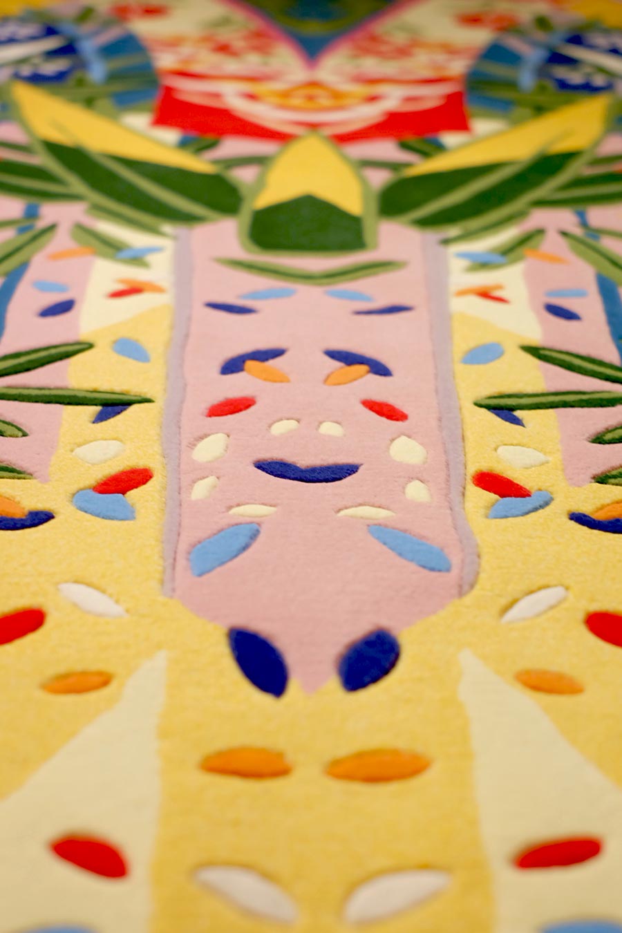 Close up of island sond rug by camilla multicoloured tribal