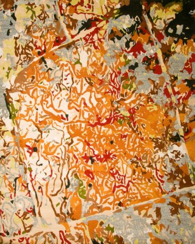 overhead of orange tessellation rug by caroline baum