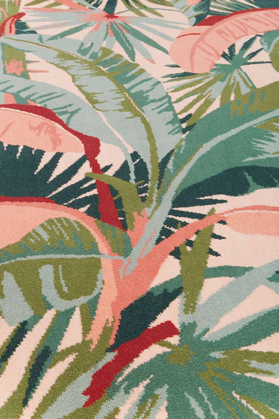 Detailed view of tropical La Palma carpet in pink and green colour