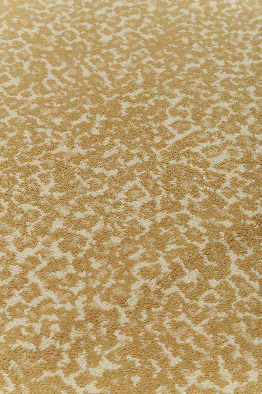 Detailed view of leopard print Leopardo carpet in beige colour