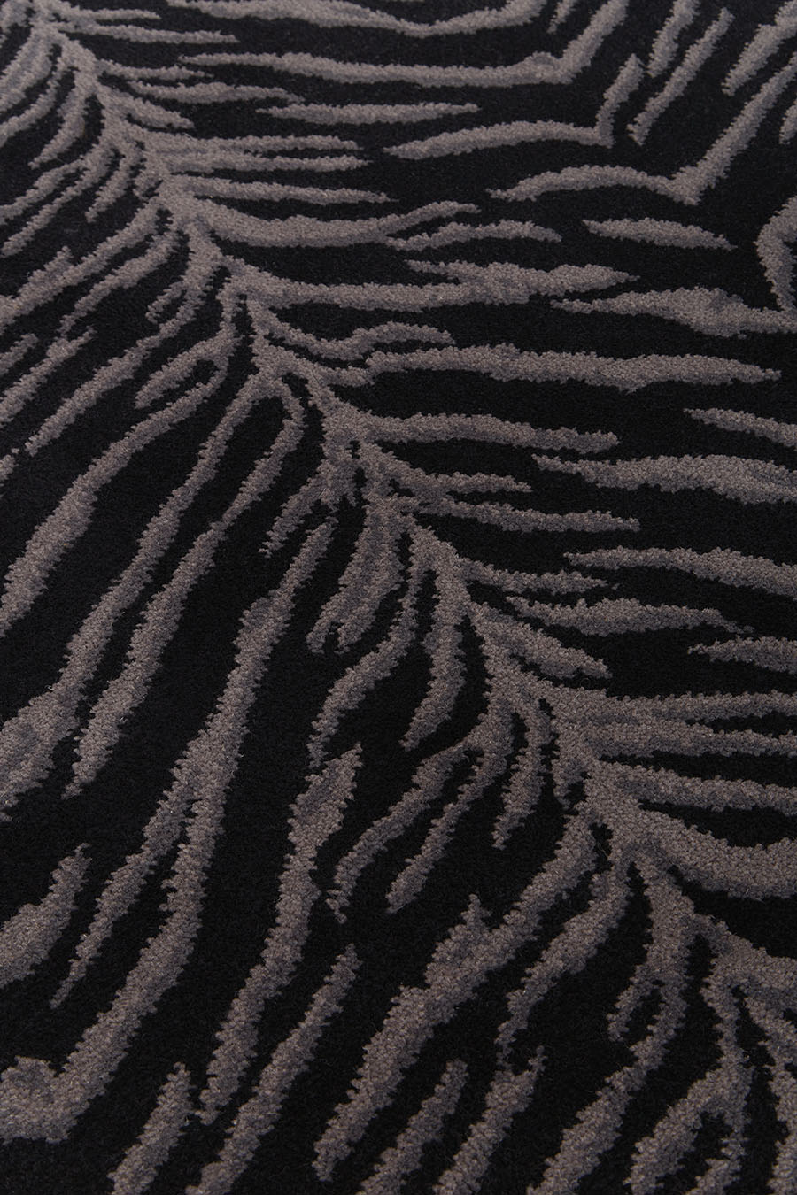 Detailed image of tiger print Tigre carpet in black