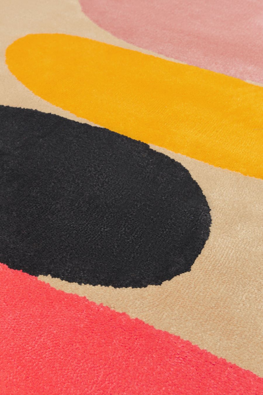 image of the pebbles rugs designed by dinosaur-designs-