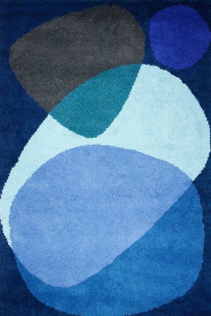 overhead of luna eclipse rug by dinosaur designs large blue shapes