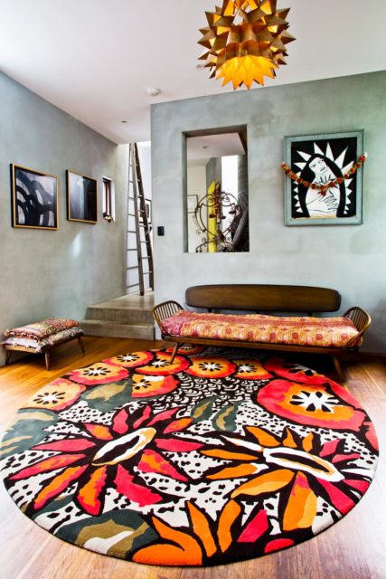location shot of passion flower round rug by easton pearson