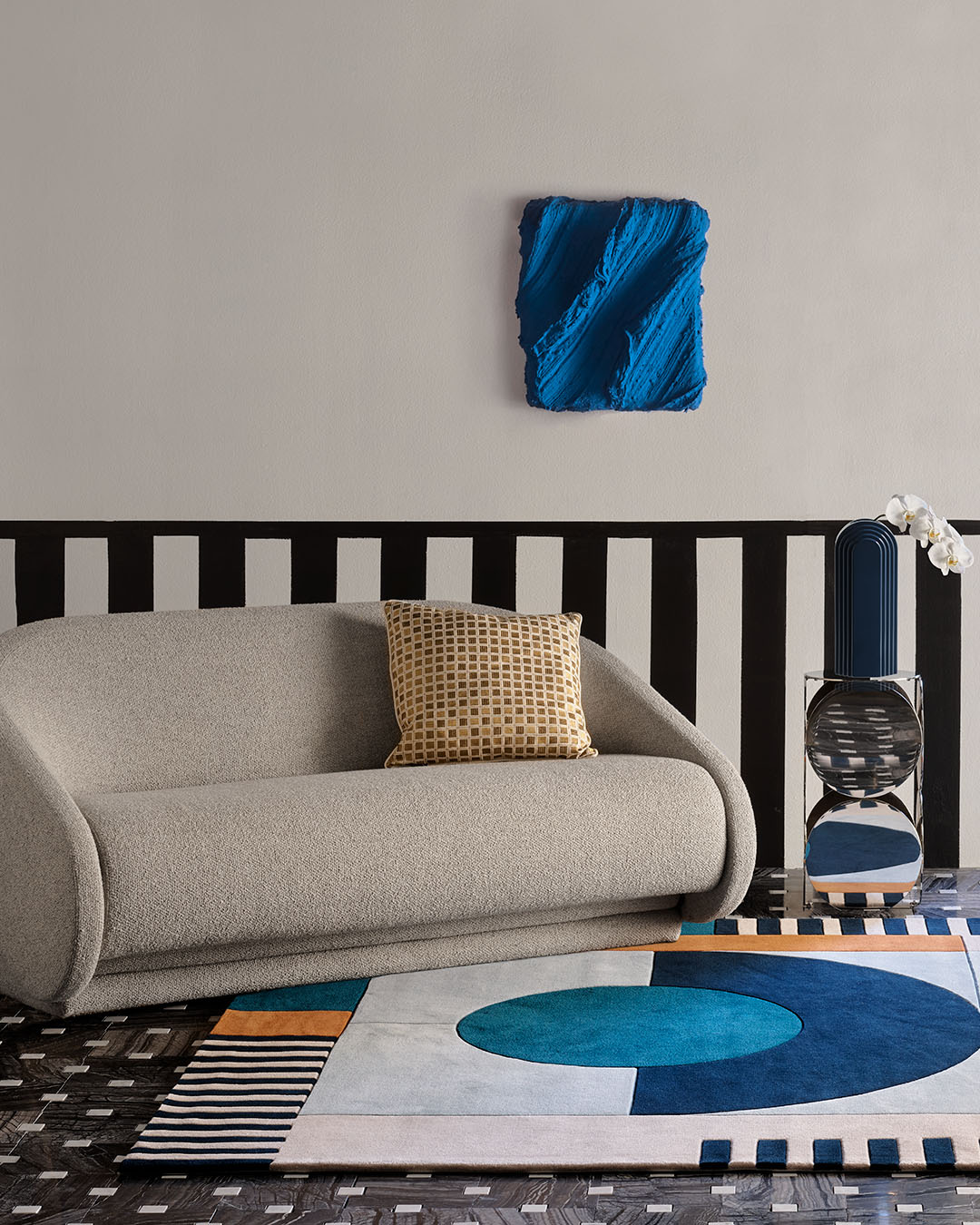 Living room image of geometric Banto rug by Greg Natale