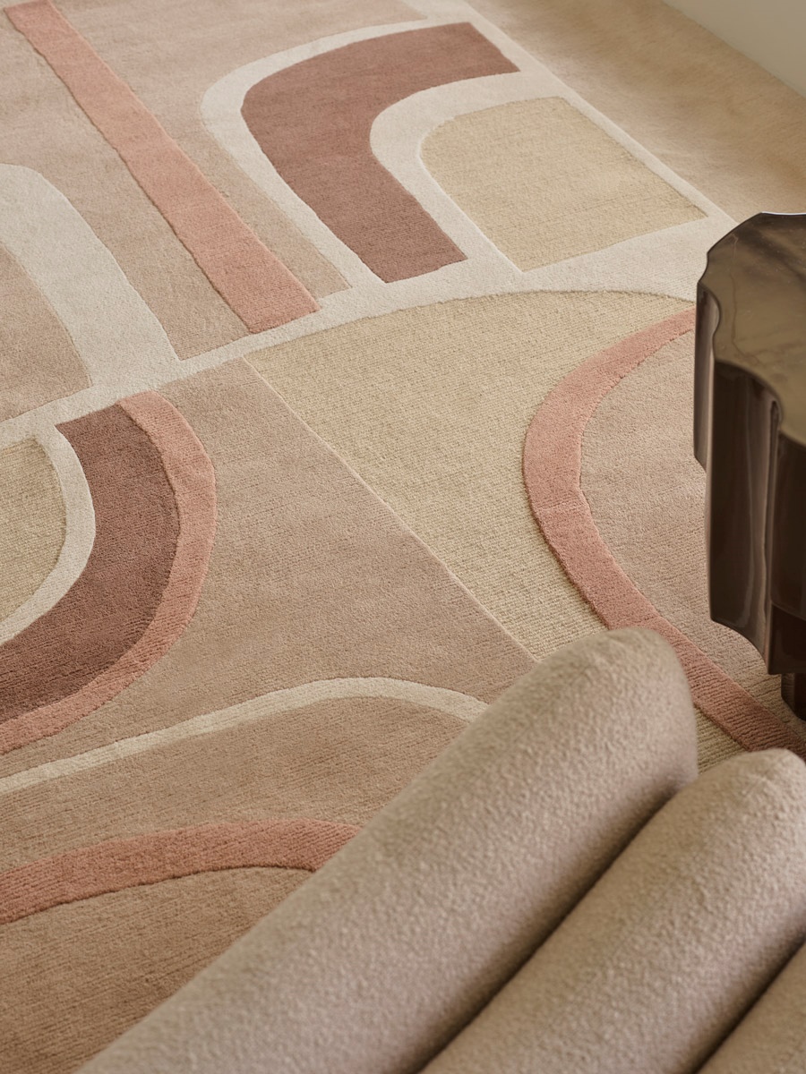 Dura is handknot rug by Greg Natale styled in a sophisticated interior – luxury designer rug with structured geometric pattern, handknotted in wool for elegance, texture, and lasting quality