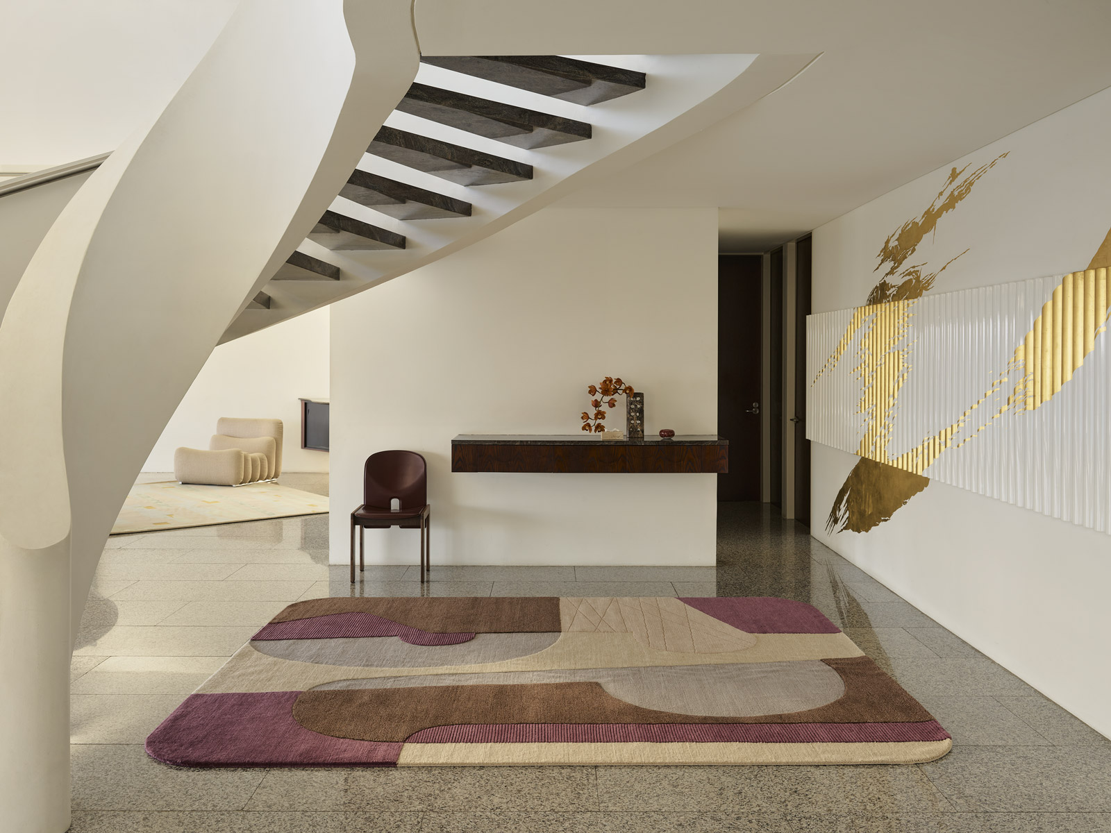 Rozzo wool handknot rug by Greg Natale styled in a modern interior – luxury designer rug with tonal geometric pattern, handknotted in wool for texture, depth, and durability