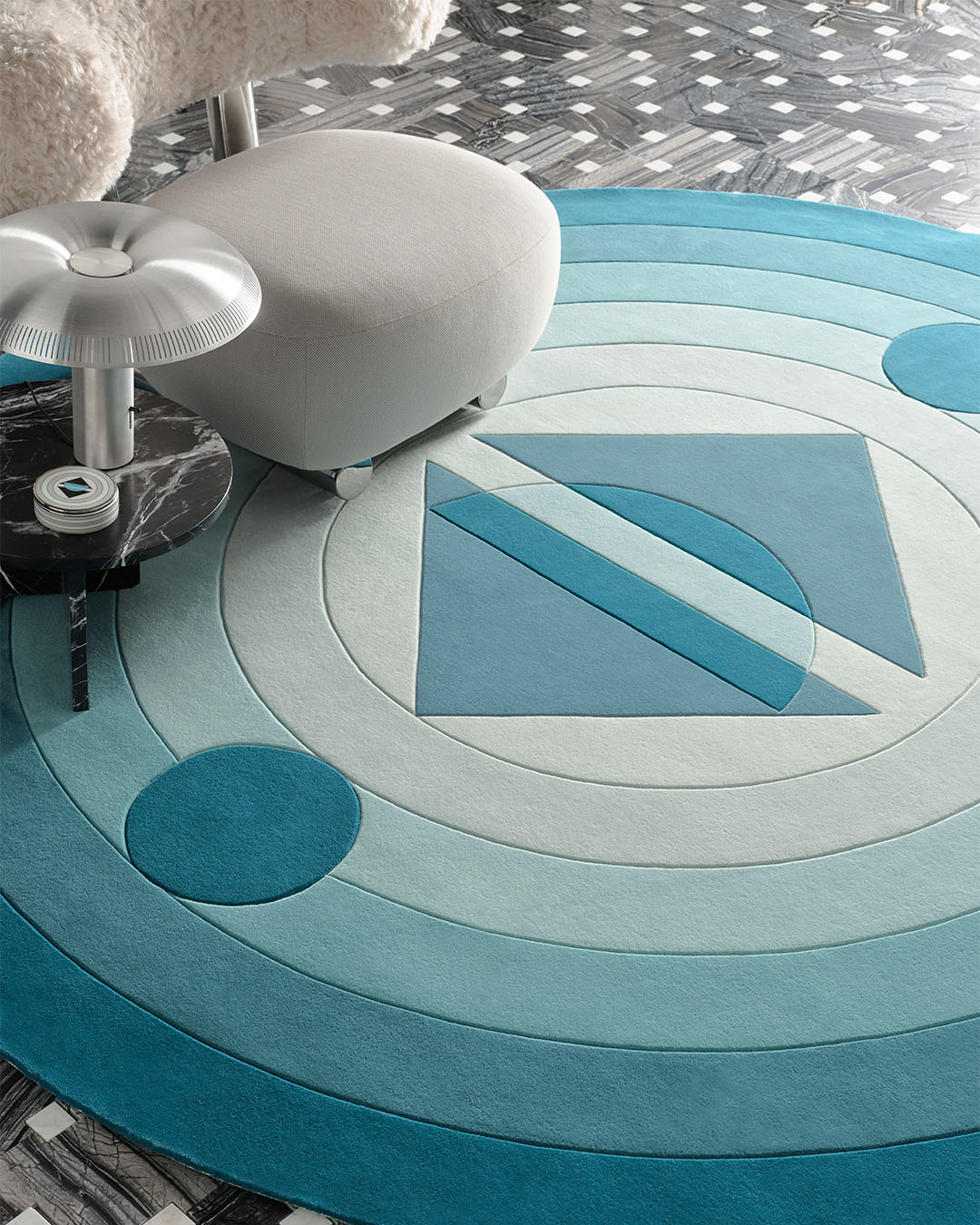 Detailed image of round Mezza Luna rug by Greg Natale