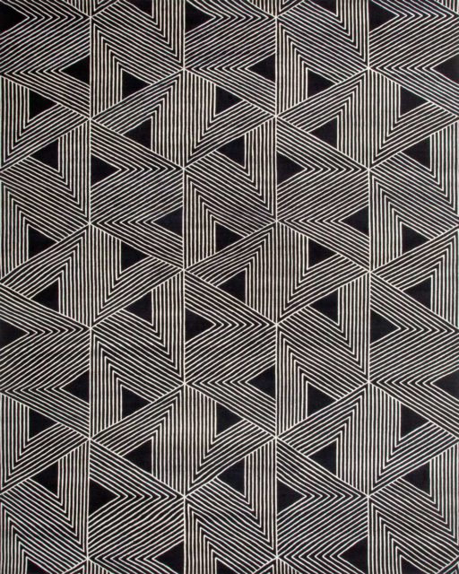 overhead of tokyo rug by greg natale white geometric lines on black background