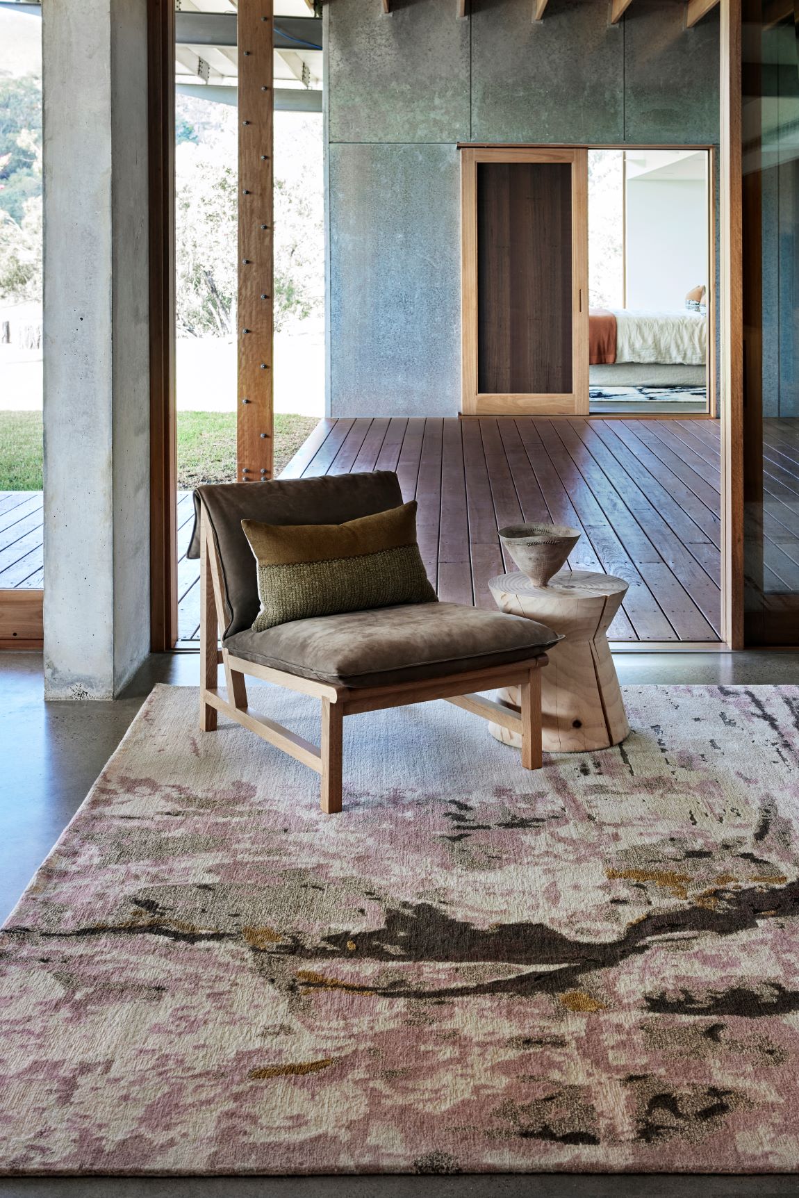 Location image of organic crevasse handknot rug by Hare and Klein in pink, gold and beig