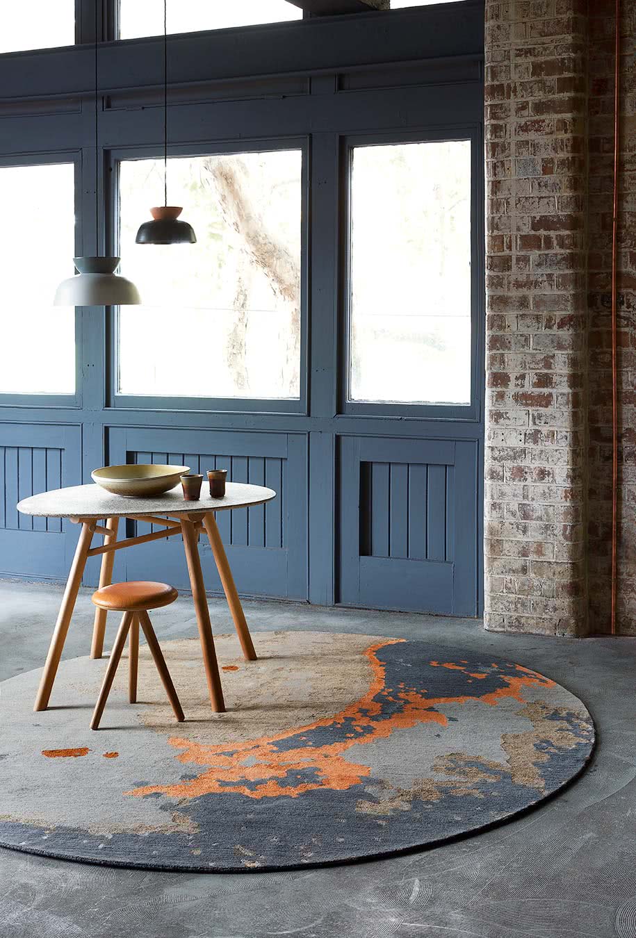 location shot of aceto round rug by hare + klein