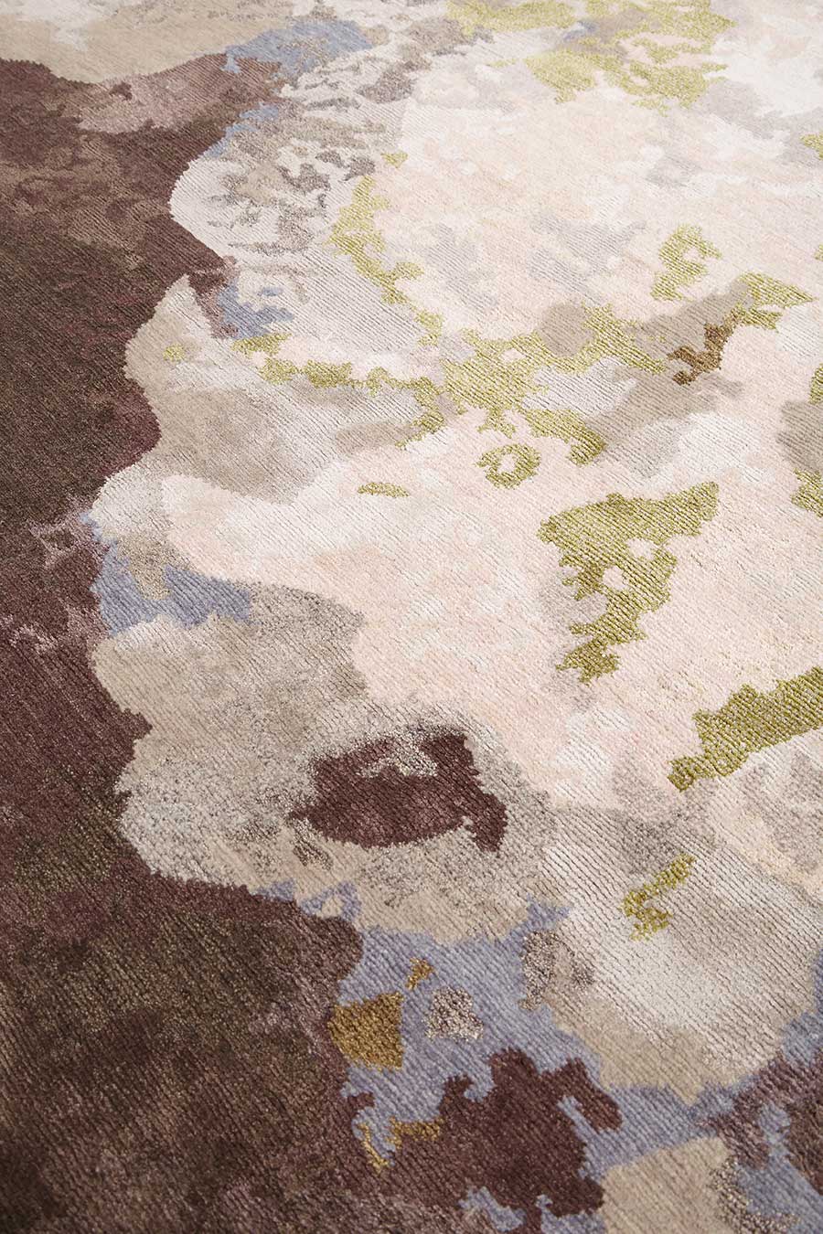 Close up image of multicoloured Botanic handknot rug by Hare + Klein