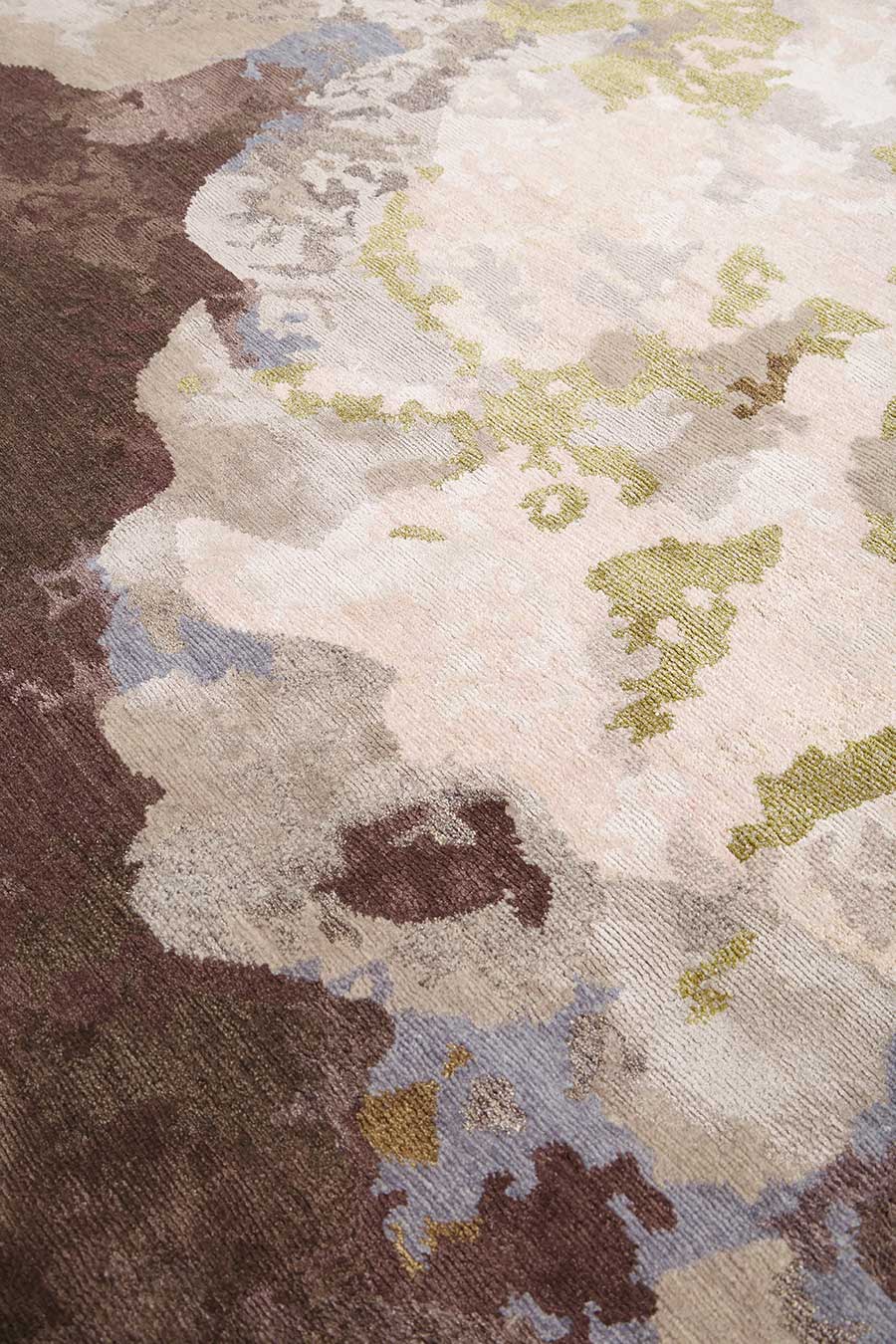 Close up image of multicoloured Botanic handknot rug by Hare + Klein