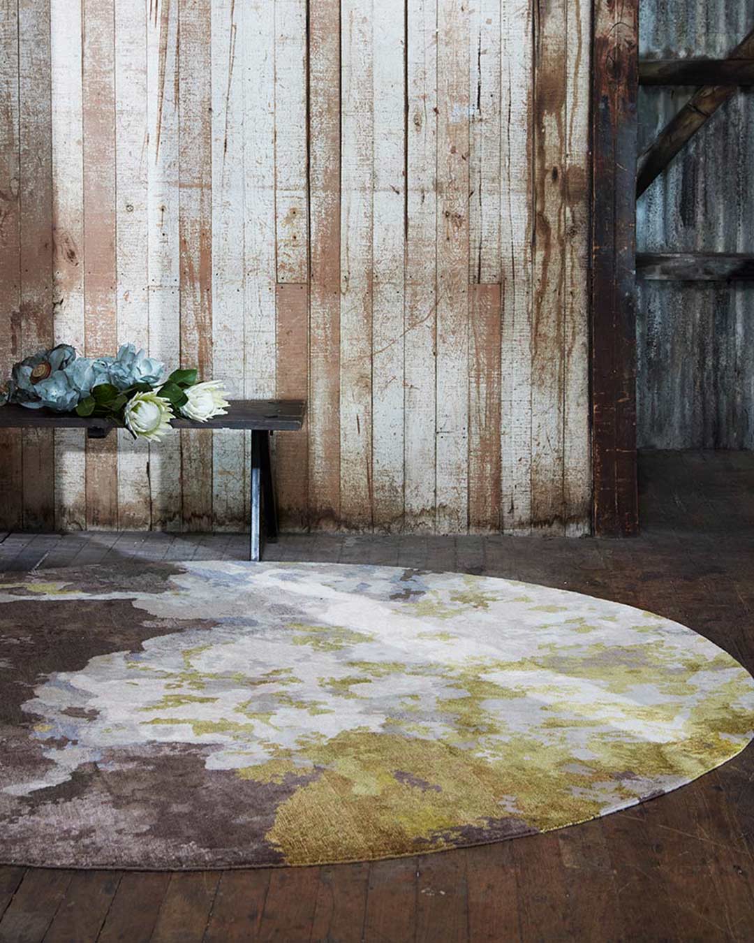 Styled image of multicoloured Botanic handknot rug by Hare + Klein