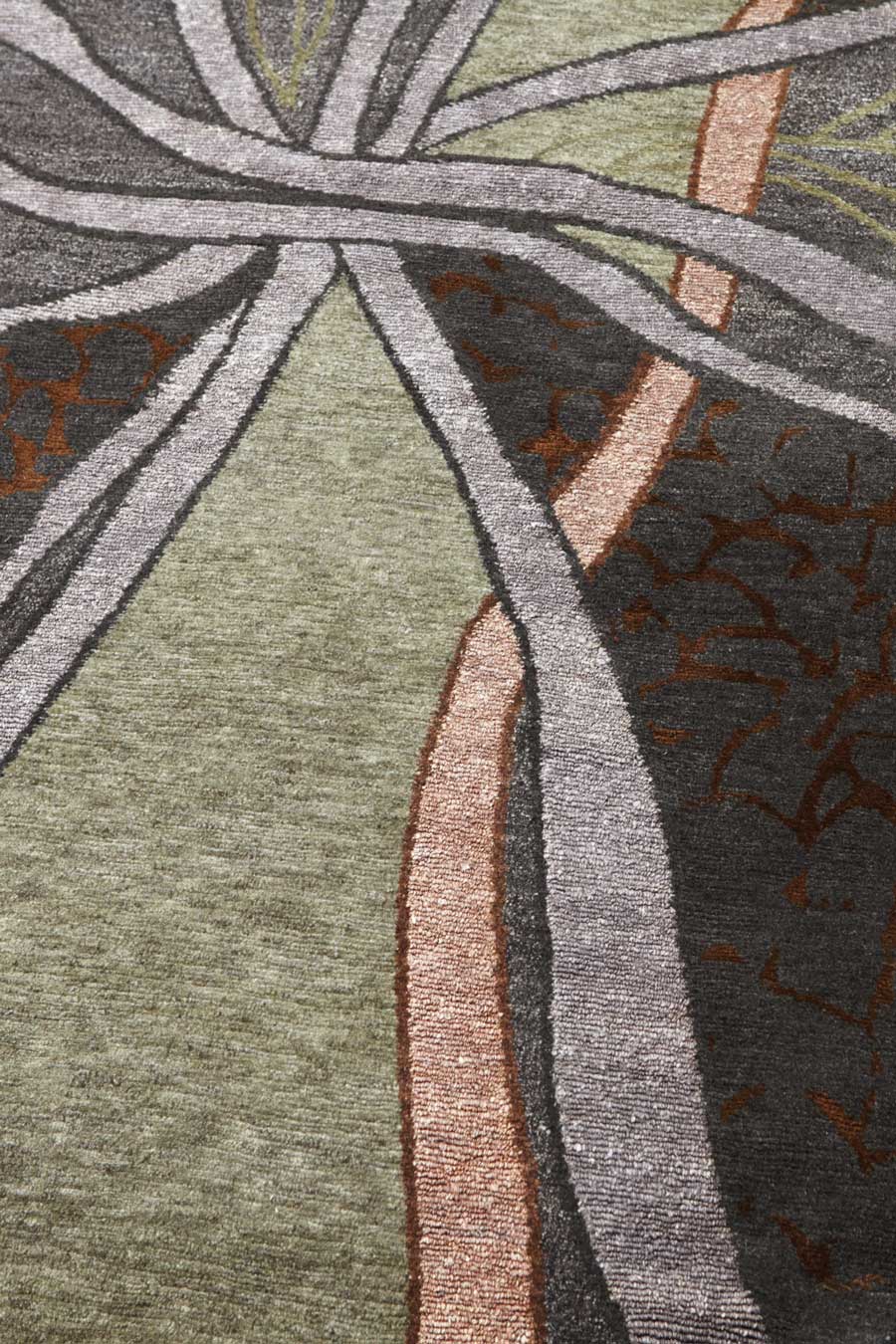 Detailed image of organic Erosion rug by Hare and Klein in green colour