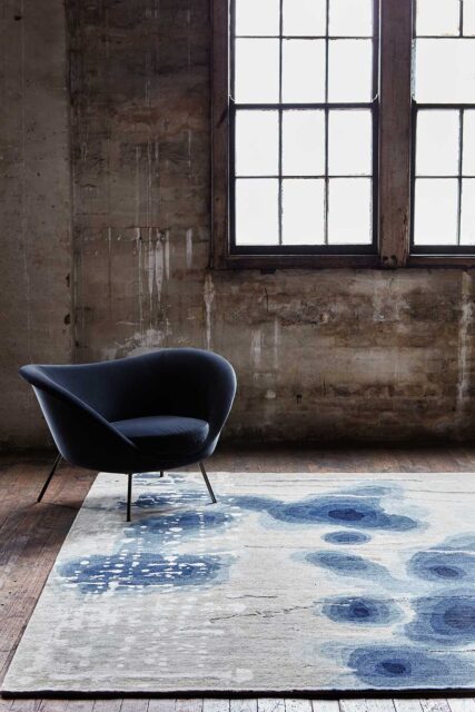 Styled image of painterly Inkblot handknot rug by Hare + Klein