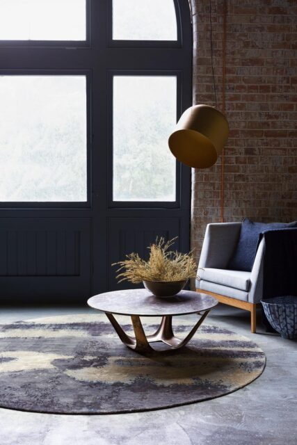 Living room image of textural Landscape rug by Hare and Klein in grey colour